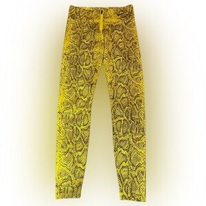 Nike Python leggings exposed zipper in speed yellow size S. Sold at Revolve